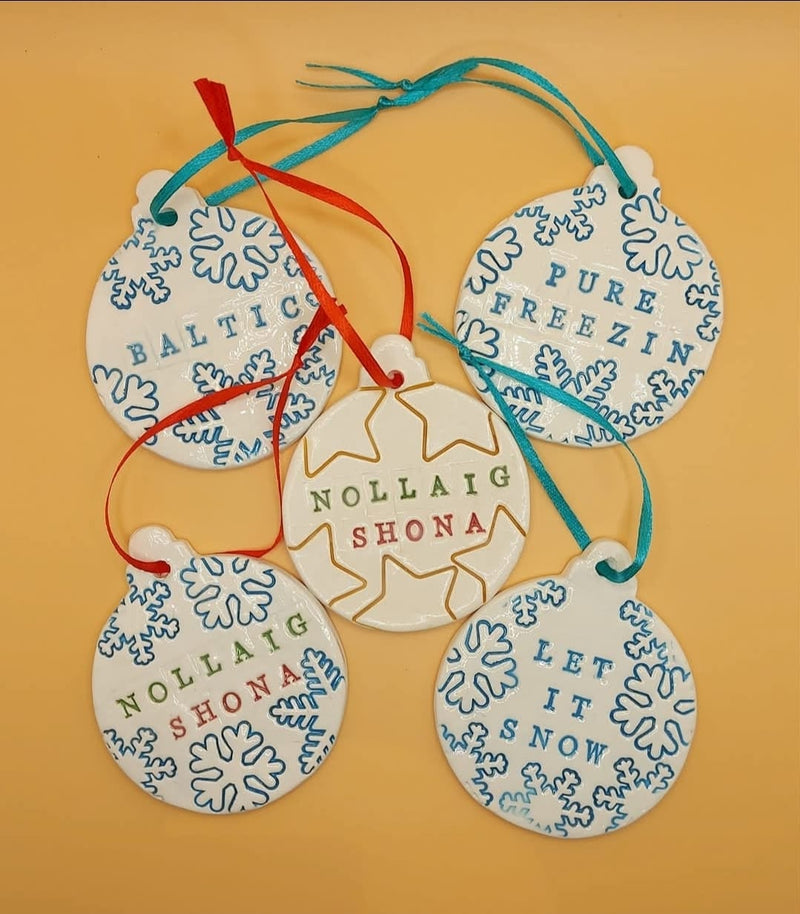 Christmas ceramic baubles with Irish phrases